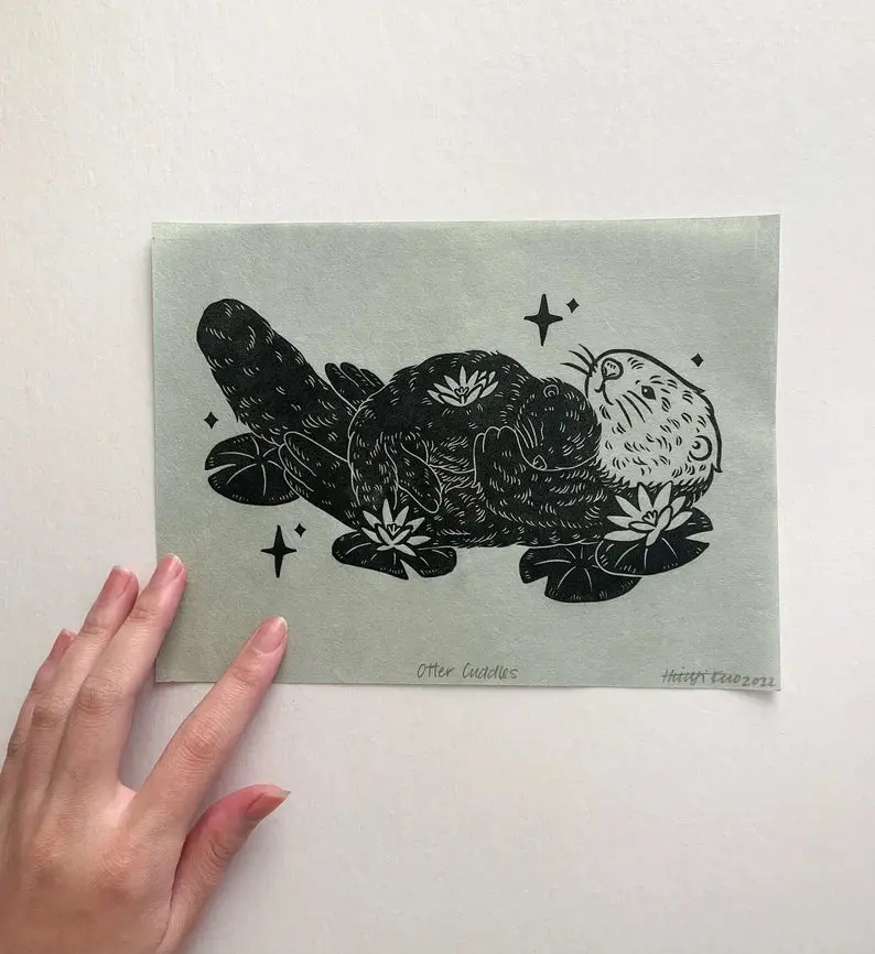 Otter Cuddles Art Print – Playful Wildlife Illustration By Huiyi Kuo 1