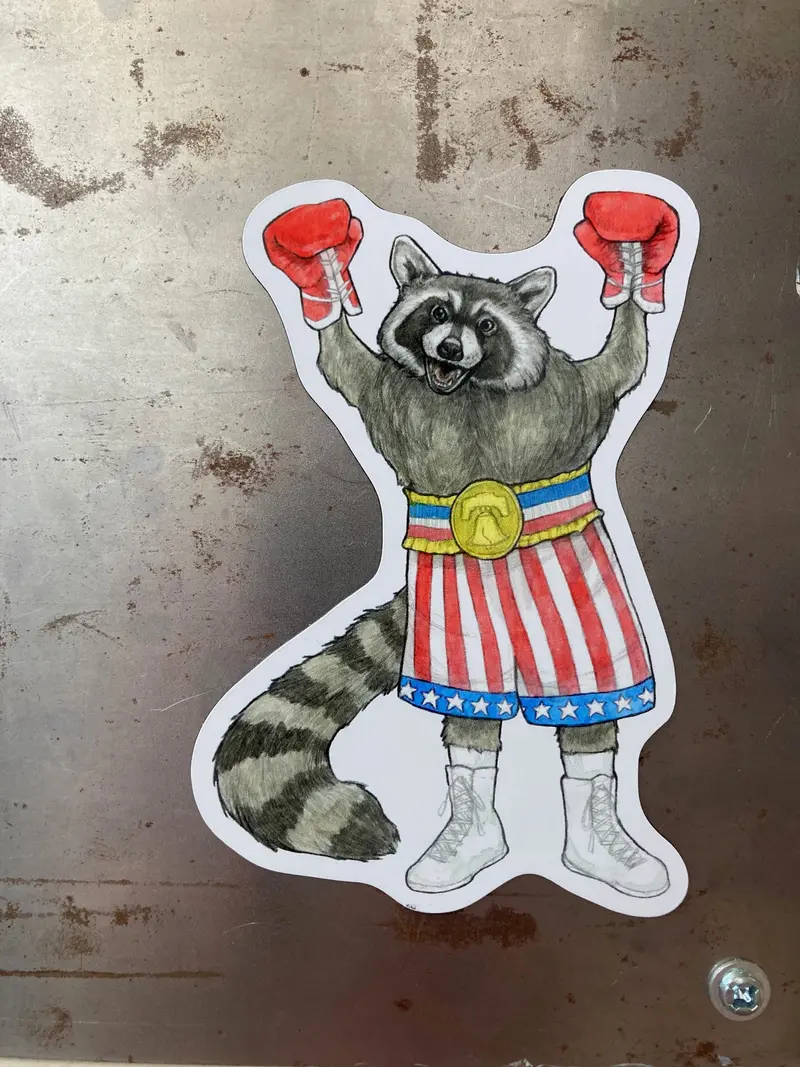 Sarah Draws Things – Rocky Raccoon Enamel Magnet 1