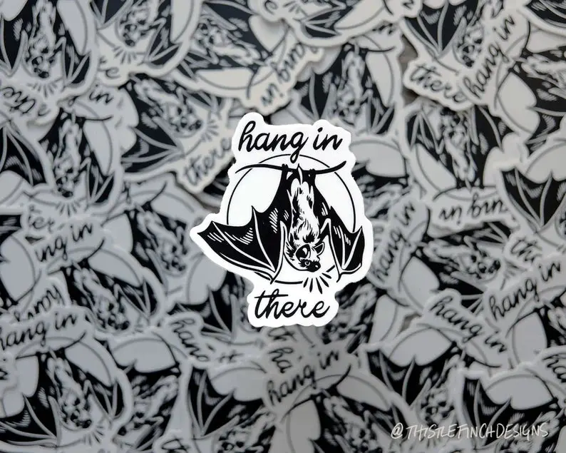 Thistle Finch Encouraging Bat Sticker – 'Hang In There' 1